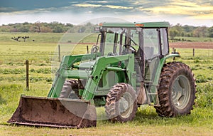 Tractor in a field on a rural Maryland farm during Spring