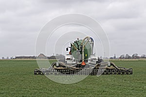 Injection of liquid manure with a liquid manure spreader.