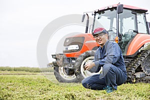 Tractor and Japanese farmer