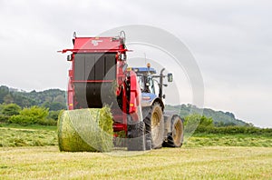 Tractor and lely baler