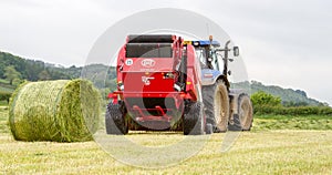 Tractor and lely baler