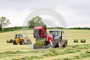Tractor and lely baler