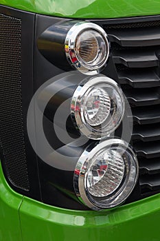 Tractor lights and grille closeup