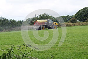 Tractor and Muck Spreader Fertiliser photo
