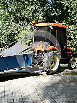 Tractor in outdoor with trailer