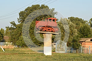 Tractor on a pedestal