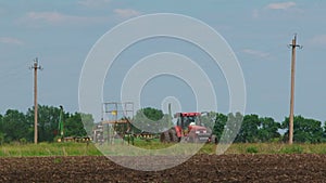 Tractor Planting Crops In The Field