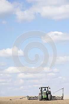 Tractor Planting Seed In Field