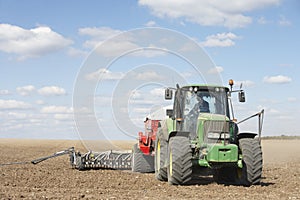 Tractor Planting Seed In Field