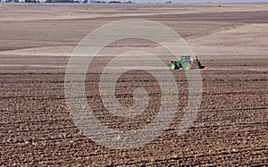 Tractor planting wheat