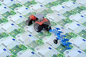 Tractor, plough and Euros photo