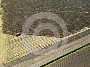 A tractor ploughing a field