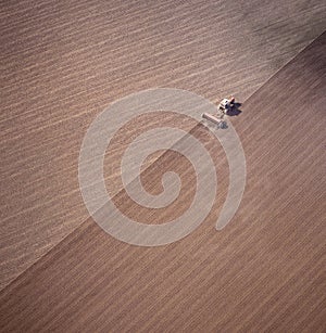 tractor ploughing a paddock. photo