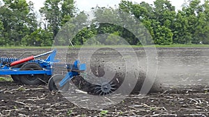 Tractor plow land.