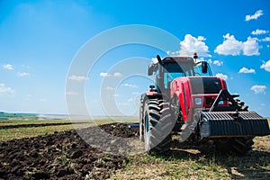 Tractor while plowing