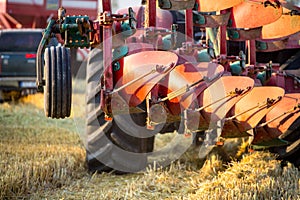 Tractor with plowing equipment