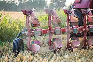Tractor with plowing equipment