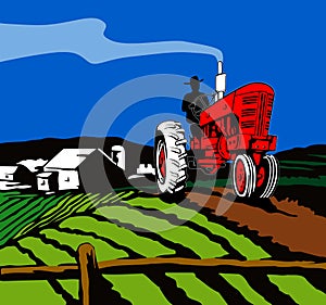 Tractor plowing the farm