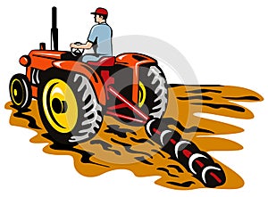 Tractor plowing the farm