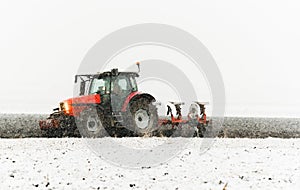 Tractor plowing a field