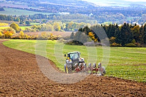 Tractor plowing the field