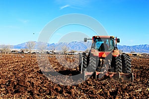 Tractor Plowing Field