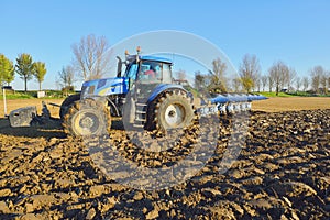 Tractor plowing the field