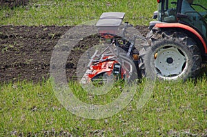 Tractor plowing a field