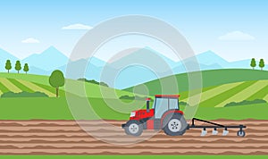 Tractor plowing the field on rural landscape background. Agriculture concept.