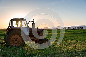 Tractor plowing fields.