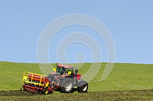 Tractor plowing the ground