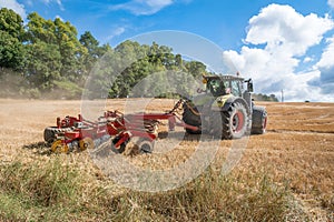 Tractor plows a field - agriculture and agronomy concept