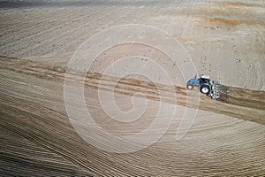 Tractor plows flight top view. photo