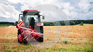 Tractor plows the land