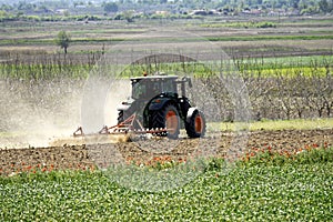 tractor preparing the fields