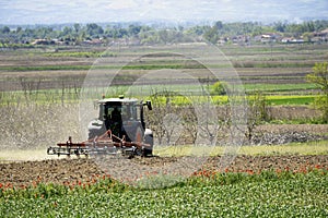 tractor preparing the fields