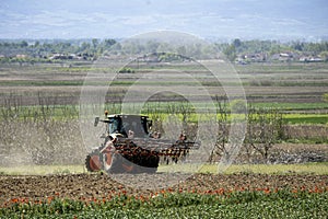 tractor preparing the fields