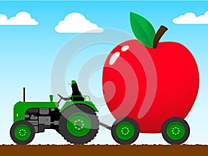 Tractor pulling a huge apple