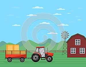 Tractor pulling trailer with hay banner