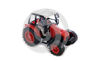 Tractor red toy on white