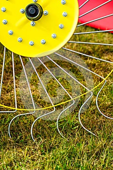 Tractor with rotary rake, agriculture machine