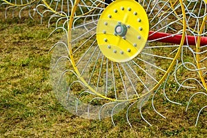 Tractor with rotary rake, agriculture machine