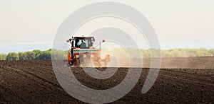 Tractor and seeder for sowing corn