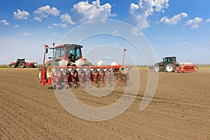 Tractor sowing and cultivating field