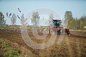 Tractor sowing field