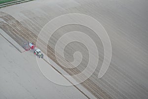 Tractor at sowing in the field