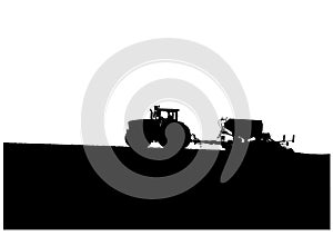 Tractor sown in the field photo
