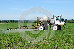 Tractor spaying pesticide