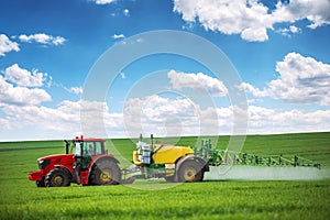 Tractor spray fertilizer spraying pesticides on green field, agriculture background concept