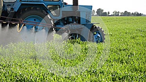 Tractor spray herbicide